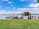 Boat lift and dock with access to open water and city views at 334 Blanca Ave, Tampa, FL 33606