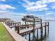 Private dock with boat lift and waterfront access at 334 Blanca Ave, Tampa, FL 33606