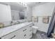 Updated bathroom with white cabinets and marble countertops at 3515 41St S Ter # 221, St Petersburg, FL 33711