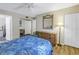 Main bedroom with a queen-size bed and ample closet space at 3515 41St S Ter # 221, St Petersburg, FL 33711