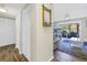 Hallway with white closet doors and wood floors at 3515 41St S Ter # 221, St Petersburg, FL 33711