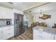 Modern kitchen features stainless steel appliances and granite countertops at 3515 41St S Ter # 221, St Petersburg, FL 33711