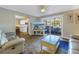 Bright living room with comfy couches and a large TV at 3515 41St S Ter # 221, St Petersburg, FL 33711