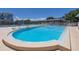 Community pool with plenty of lounge chairs at 3515 41St S Ter # 221, St Petersburg, FL 33711