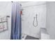 Walk-in shower with tiled walls and a built-in seat at 3515 41St S Ter # 221, St Petersburg, FL 33711