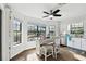 Modern kitchen featuring an island and ample natural light at 37120 Foxrun Pl, Zephyrhills, FL 33542