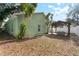 Charming backyard with a pergola and spacious patio area at 3804 N Arlington Ave, Tampa, FL 33603