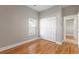 Bright bedroom with hardwood floors and double door closet at 3804 N Arlington Ave, Tampa, FL 33603