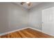 Bright bedroom with hardwood floors and neutral walls at 3804 N Arlington Ave, Tampa, FL 33603