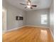 Bright bedroom with hardwood floors and ceiling fan at 3804 N Arlington Ave, Tampa, FL 33603