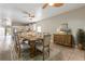 Dining room with a wooden table and chairs, and an area rug at 3804 N Arlington Ave, Tampa, FL 33603