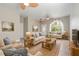 Living Room with two sofas, a wooden coffee table, and a TV at 3804 N Arlington Ave, Tampa, FL 33603
