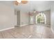 Large living room with tile floors and neutral wall colors at 3804 N Arlington Ave, Tampa, FL 33603
