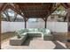 Cozy pergola-covered patio with seating area at 3804 N Arlington Ave, Tampa, FL 33603