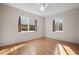 Bedroom with hardwood floors and window overlooking yard at 4156 10Th N Ave, St Petersburg, FL 33713