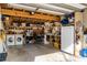 Garage with lots of storage and a workbench at 4156 10Th N Ave, St Petersburg, FL 33713