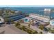 Aerial view of a waterfront condo community with a pool at 433 S Paula Dr # 32, Dunedin, FL 34698