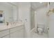 Bright, white bathroom featuring a shower/tub combo and single vanity at 433 S Paula Dr # 32, Dunedin, FL 34698