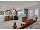 Bright main bedroom featuring neutral carpet, an area rug, and great natural light at 433 S Paula Dr # 32, Dunedin, FL 34698