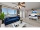 Staged main bedroom offering a spacious layout and views of the water at 433 S Paula Dr # 32, Dunedin, FL 34698