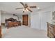 Large main bedroom with ample closet space, ceiling fans, and water views at 433 S Paula Dr # 32, Dunedin, FL 34698