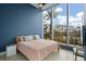Bright bedroom with large window and city views at 5120 Marina Way # 112, Tampa, FL 33611