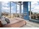 Main bedroom with floor to ceiling windows and water views at 5120 Marina Way # 112, Tampa, FL 33611