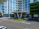 Modern building entrance with covered parking at 5120 Marina Way # 112, Tampa, FL 33611