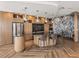 Modern community kitchen with granite countertops and stainless steel appliances at 5120 Marina Way # 112, Tampa, FL 33611
