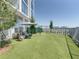 Landscaped dog park with seating and fire hydrant at 5120 Marina Way # 112, Tampa, FL 33611