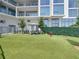 Artificial turf dog park with seating area at 5120 Marina Way # 112, Tampa, FL 33611
