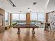 Game room with pool table and waterfront views at 5120 Marina Way # 112, Tampa, FL 33611