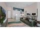 Open living area with modern kitchen, workspace and comfy couch at 5120 Marina Way # 112, Tampa, FL 33611