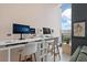Bright office space with large windows and two work stations at 5120 Marina Way # 112, Tampa, FL 33611