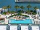 Resort-style pool and deck with lounge chairs and umbrellas at 5120 Marina Way # 112, Tampa, FL 33611