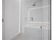 Modern shower with glass enclosure and window at 5120 Marina Way # 112, Tampa, FL 33611