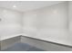 Minimalist steam room with white tile and stone bench and tiled floor at 5120 Marina Way # 112, Tampa, FL 33611