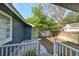 Small side yard with gravel pathway and white railing at 5807 N 17Th St, Tampa, FL 33610