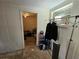 Home hallway with access to bedroom and closet at 8627 Longboat Ln, Hudson, FL 34667