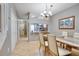 Dining area with view of kitchen and entryway at 8635 Hunters Key Cir, Tampa, FL 33647