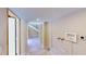 A large basement area with a staircase at the end of the hallway at 1149 Sedeeva St, Clearwater, FL 33755
