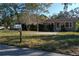 Cute one-story house with a well-maintained lawn at 1149 Sedeeva St, Clearwater, FL 33755