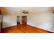 Simple living room with hardwood floors and high ceilings at 1149 Sedeeva St, Clearwater, FL 33755