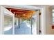 Outdoor patio with a concrete floor and a covered ceiling at 1149 Sedeeva St, Clearwater, FL 33755