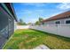 Fenced backyard with covered patio at 11926 Cinnamon Fern Dr, Riverview, FL 33579