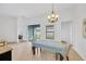 Bright dining room with sliding glass doors leading to the backyard at 11926 Cinnamon Fern Dr, Riverview, FL 33579
