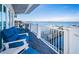 Waterfront condo balcony has ample seating and features water views at 1860 N Fort Harrison Ave # 104, Clearwater, FL 33755