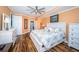 Spacious primary bedroom with king-size bed and en-suite bathroom at 1860 N Fort Harrison Ave # 104, Clearwater, FL 33755