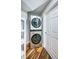 Convenient laundry room with stacked washer and dryer at 1860 N Fort Harrison Ave # 104, Clearwater, FL 33755