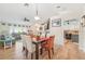 Dining room with dark wood table and white chairs at 2048 Berry Roberts Dr, Sun City Center, FL 33573